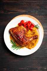 Autumn meal: roasted chicken quarter with mashed pumpkin