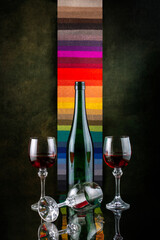 Still life with glasses of wine and glass bottle