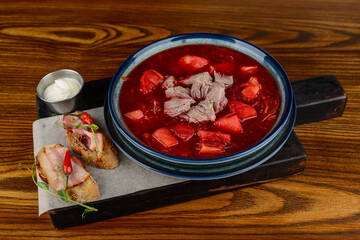 Ukrainian folk dish red borscht in a plate
