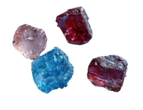 Close-up of four crystalline gems, exhibiting vibrant shades of crimson, deep blue, and mauve.  The gems have a faceted, almost cubic shape, and are arranged loosely