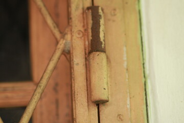 close up of a nail in the wood