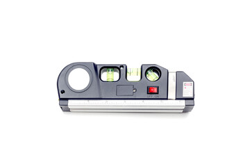 The measuring equipment spirit level with laser close-up