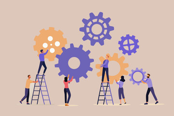 Diverse team of people working together assembling gears for a collaborative project or business solution