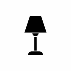 Table lamp with simple design and elegant shade. Table lamp is perfect for home decor and adds a touch of sophistication to any room.