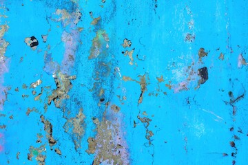 Distressed blue surface with gold and iridescent accents. 90s grunge vibe, textured, vintage. Background, digital art, creative projects, modern 90s, Y2K visuals.