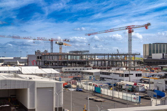 Auckland Airport, New Zealand. New domestic terminal under construction in 2025, due for completion in 2029 at an estimated cost of NZ$2.2 billion.