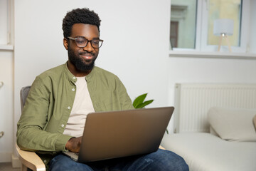 Young businessman having a video call and looking involved