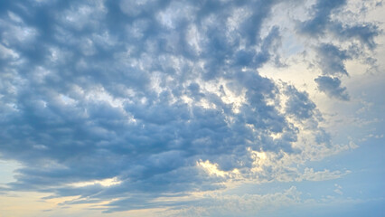 Beautiful landscape with dark clouds on light sky
