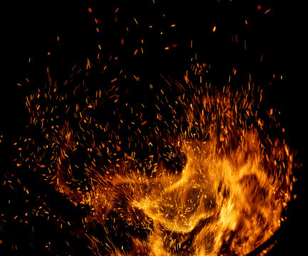 A fire is burning and the smoke is billowing out