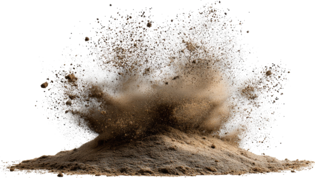 A powerful explosion of brown sand erupts from a mound