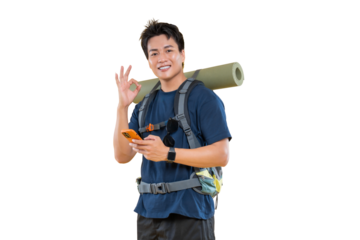 An Asian male hiker with a backpack smiling and holding a smartphone. The man is making an okay hand gesture with a clear background