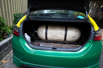 A taxi with a Compressed natural gas (CNG) tank installed in the boot of the car as alternate fuel