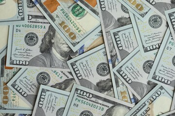 Big amount of american USD hunderd dollar bills banknotes close up