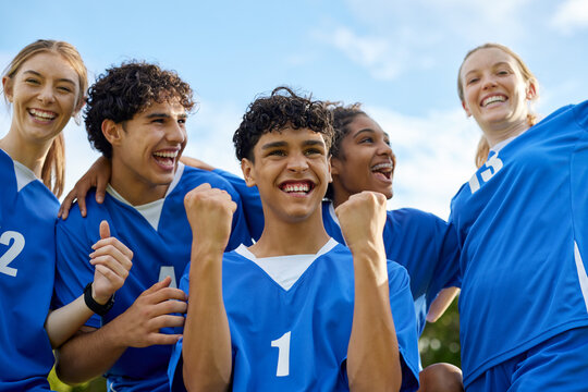 Football team celebrating a goal during a match