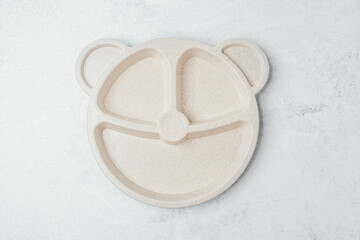 Fun and innovative bear-shaped plate for kids' mealtime enjoyment