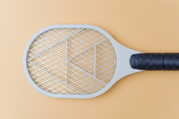 Electric bug zapper on beige background