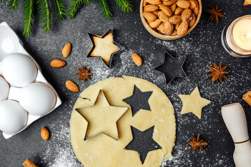Holiday cookie making with almonds and candlelight for cozy christmas flatlay and food photography...