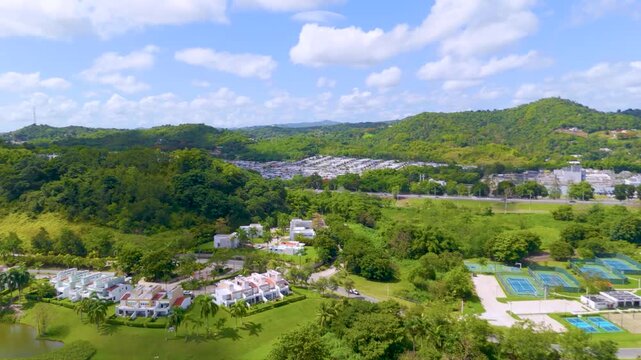 Drone footage of a Golf Course in Gurabo, Puerto Rico. Captures lush fairways, tropical scenery, and mountain views&mdash;ideal for travel, real estate, sports, and outdoor lifestyle content.