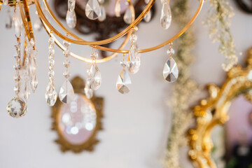 Elegant chandelier casting reflections in a beautifully decorated living space