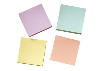 Fototapeta premium Four pastel-colored sticky notes arranged in a loose group