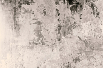 Abstract grey and white textured wall with artistic brush strokes and patterns
