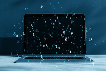 Digital binary code flowing from a laptop screen on a blue background symbolizing virtual data...