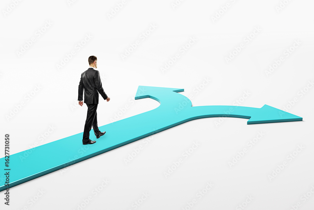 Poster businessman walking toward a split road with arrows pointing left and right on a light gradient back