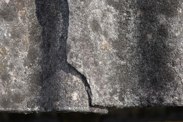 Old and very dangerous asbestos roof. Asbestos dust in the environment. Asbestos removal