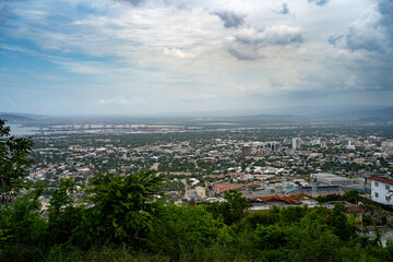 Looking out over Kingston, Jamaica from a high viewpoint in the surrounding hills