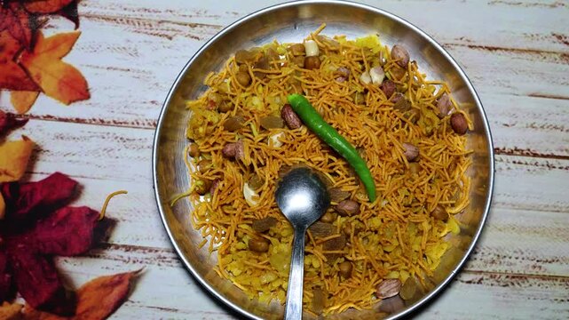 fresh home cooked poha or flattened rice with green chilli at indoor