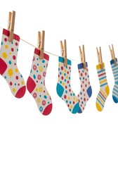 Colorful socks hanging on laundry line