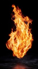 Dynamic Flame Dance Captured in High-Contrast Black Background