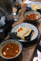 Japanese ramen noodles and broth in a restaurant 