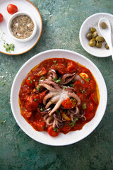 Octopus with tomato sauce and capers