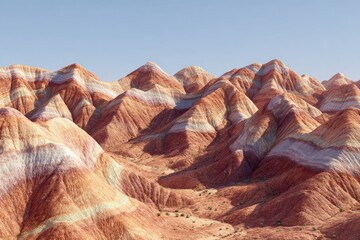 Naklejka premium Colorful, layered mountains under a clear sky