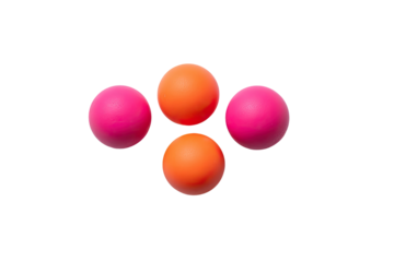 Four vibrant, round spheres in alternating pink and orange hues, symmetrically arranged against a black background