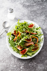 Arugula salad with smoked duck breast and fig