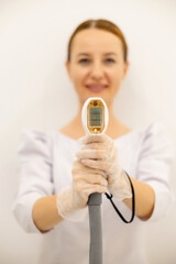 Laser hair removal treatment. Clinic skin care procedure. Medical dermatology photo equipment....