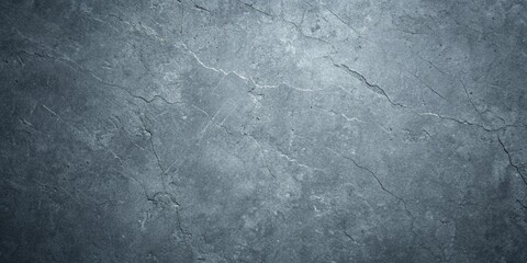 Dark gray stone texture background with a rough surface, ideal for adding a vintage or grunge effect to graphic design projects
