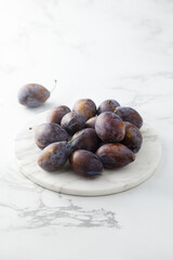 Fresh plums on a table