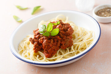 Traditional spaghetti Bolognese with fresh basil