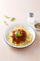 Traditional spaghetti Bolognese with fresh basil
