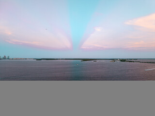 Drone view of downtown Miami skyline at sunset from over Biscayne Bay