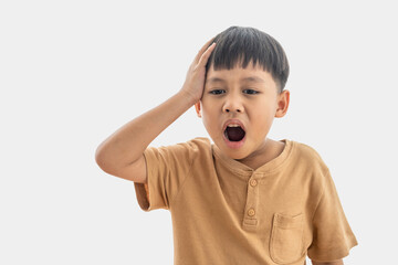 Asian boy sick depressed unhappy holding head in headache pain showing stress, illness, concept of...