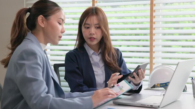 Expert woman asian people discuss review data number costing managerial account prepare monthly actual cost variance report income tax at audit office. ESG budget control ERP process service project.