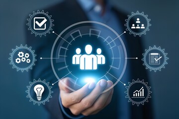 Businessman holding a digital interface with team collaboration and business process icons