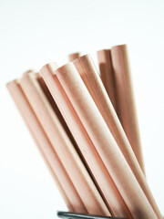 Wooden pencils grouped together on a white background ready for writing, drawing, and creative projects