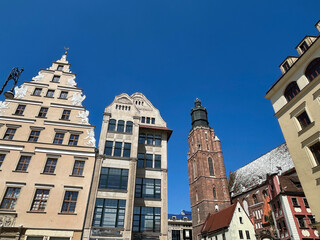 View of houses and Church of St. Elizabeth on a sunny day. Wroclaw. Poland