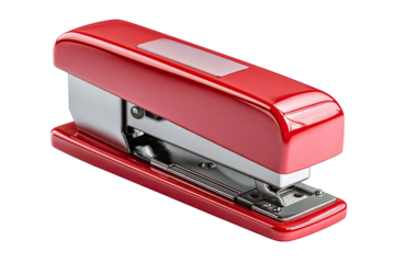 A glossy red stapler, angled, shows its metallic mechanisms