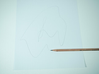 Abstract pencil drawing with flowing lines creating a visual concept for creativity and design